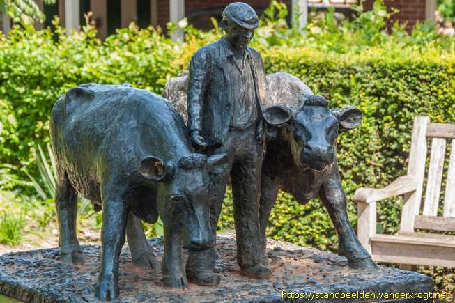Megchelen - Boer met twee koeien