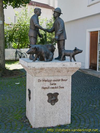 Ulm / Dr Metzgr ond dr Baur beim Handl om dui Sau
