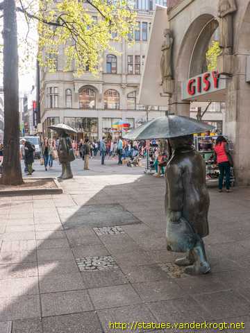 Hannover /  Zwei Leute im Regen
