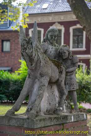 Frechen /  Kindergruppe um störrischen Esel